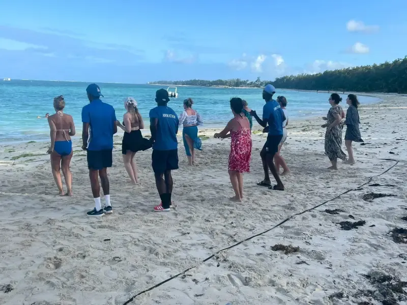 Line dancing on the beach
